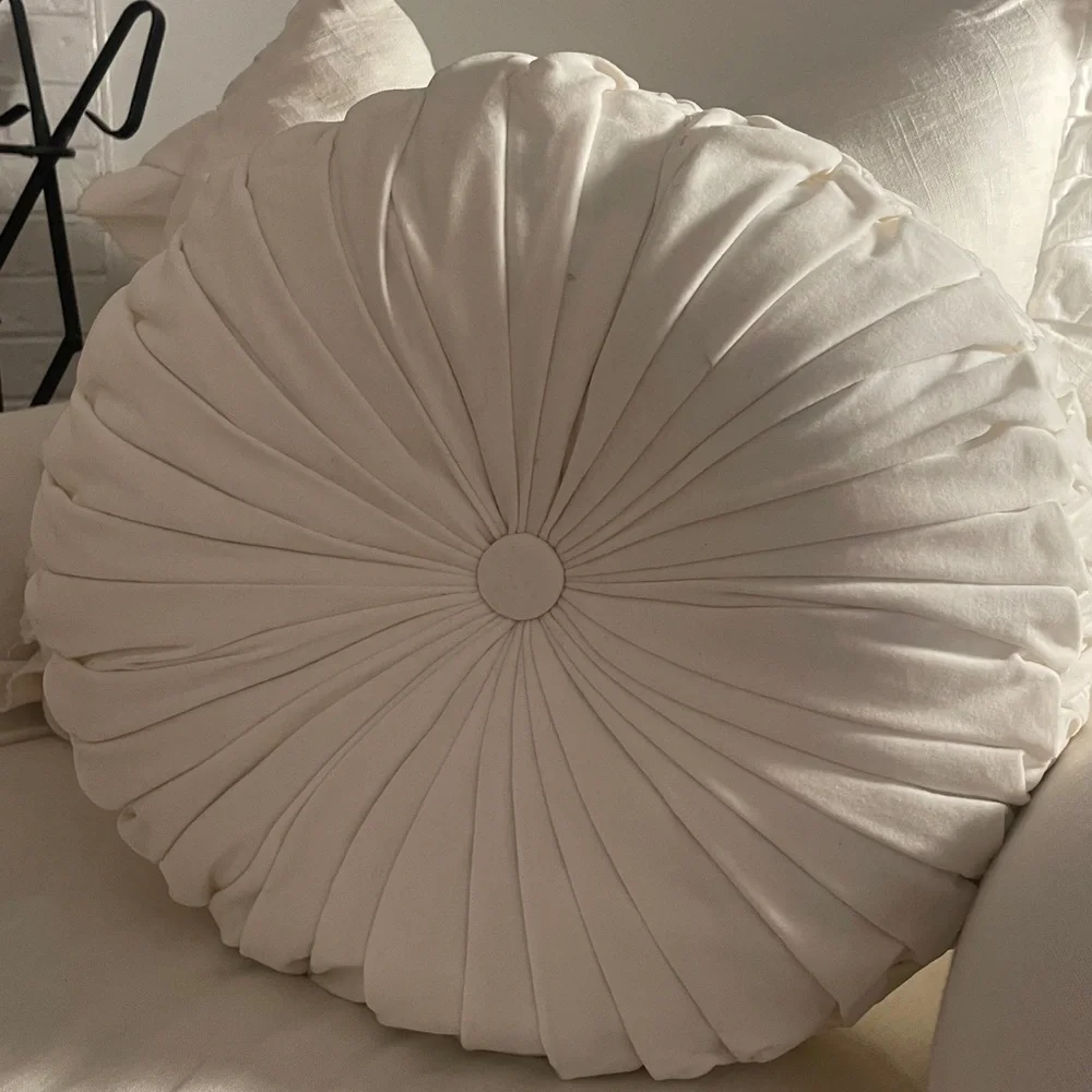 Round white velvet tufted pillow